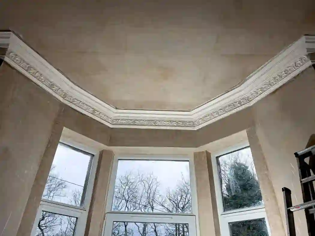 Gallery image for Cornice Repair and Plaster Restoration in Glasgow, City Centre: Window bay after the restored cornice was fitted