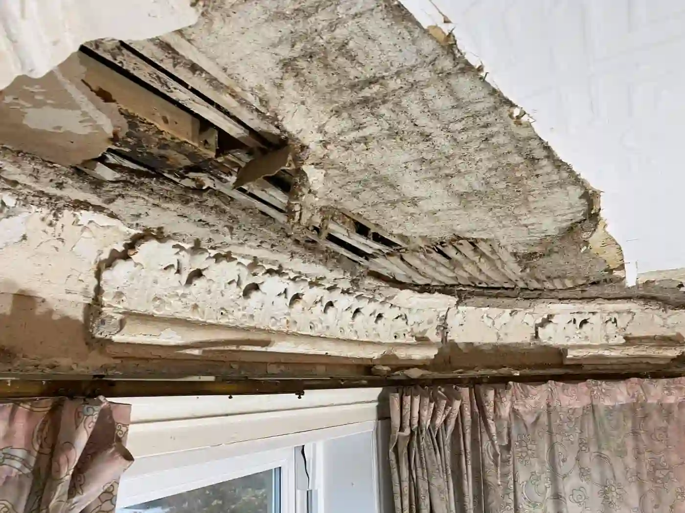 Gallery image for Cornice reproduction and installation in Kelvinbridge, Glasgow: Damaged window bay ceiling due to water ingress.